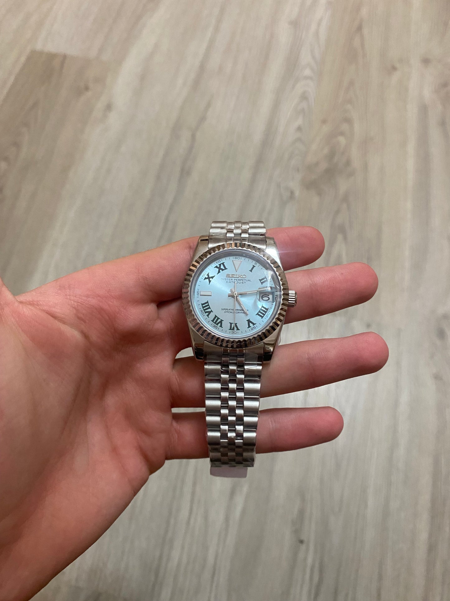 BLUE ROMAN NUMERAL